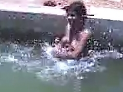 indian woman in river